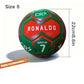 Soccer ball with 'RONALDO' branding and size 5 label, featuring dimensions and additional items like an air supply needle and ball net.