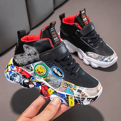 Children's sneakers with colorful designs on a gray surface
