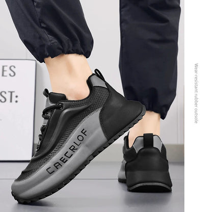 Black and gray sneakers with 'CAECILIA' branding on a light background